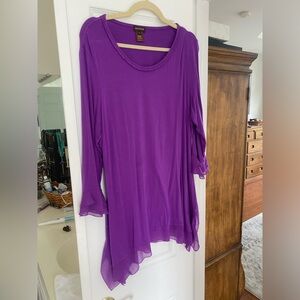 Pretty purple with lacy on bottom and end of sleeves